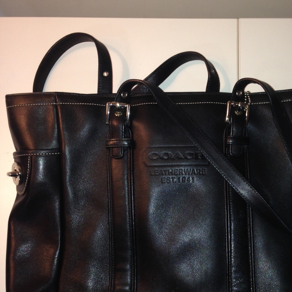 Black Coach leather shoulder bag.